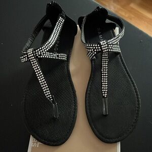 Rampage Sandals flat black with rhinestone cross over T straps zippered heel.
